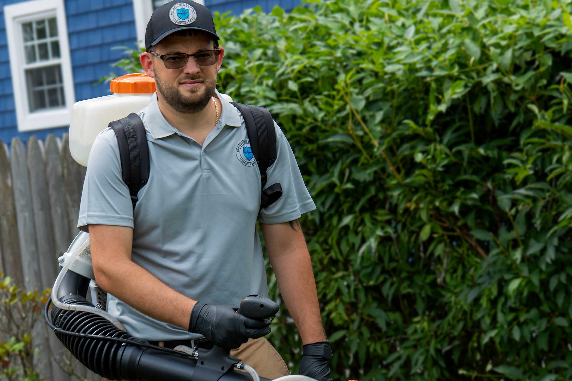 Close-up of Pro Mosquito Solutions technician in uniform, representing professional pest control services for Rhode Island and Southeastern Massachusetts.