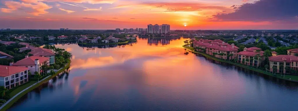a breathtaking sunset casts vibrant hues of orange and pink over a serene lake, reflecting the colorful sky and surrounded by lush greenery.