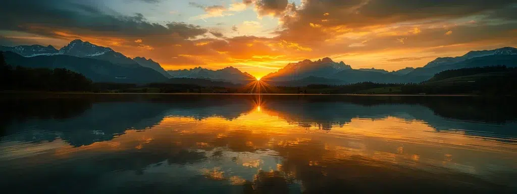 a vibrant sunset casts a warm golden glow over a serene lake, reflecting the silhouetted peaks of majestic mountains that border the horizon.
