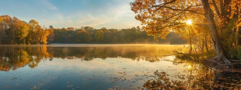 a tranquil sunrise casts golden hues over a serene lake, reflecting vibrant autumn foliage that envelops the water's edge, evoking a sense of peace and harmony in nature.